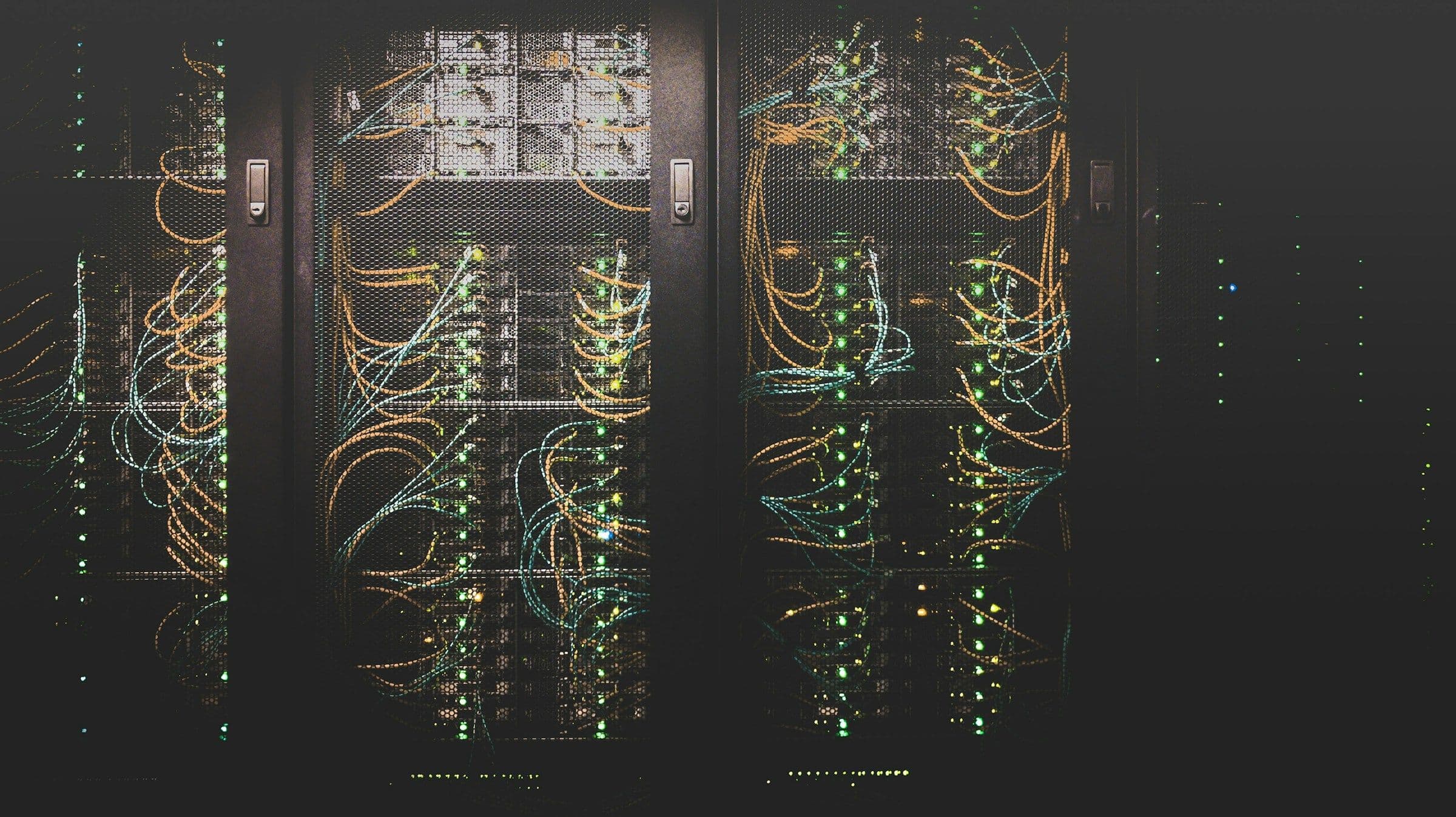 Network cabling routed through a server rack