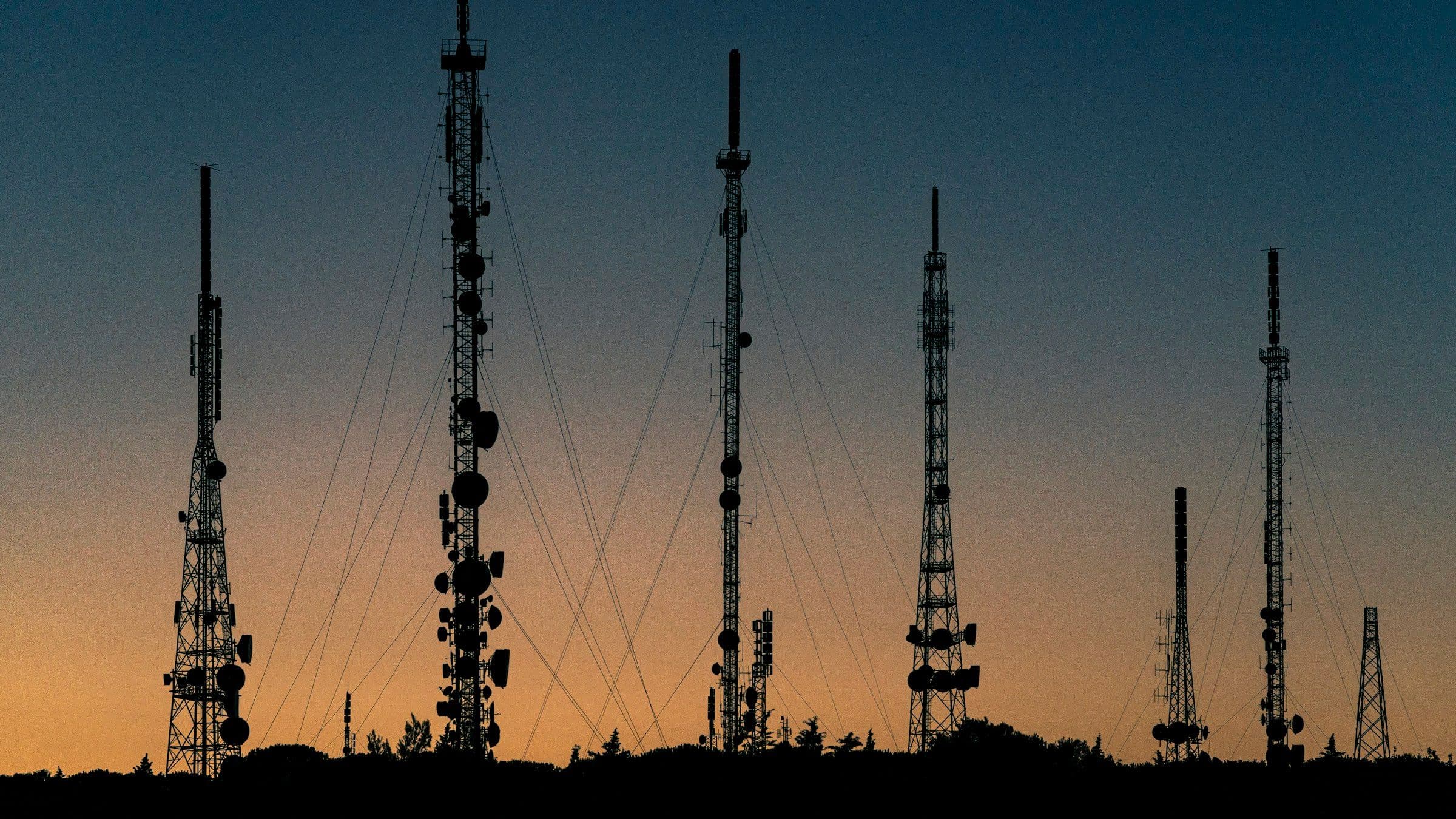 Black towers during sunset