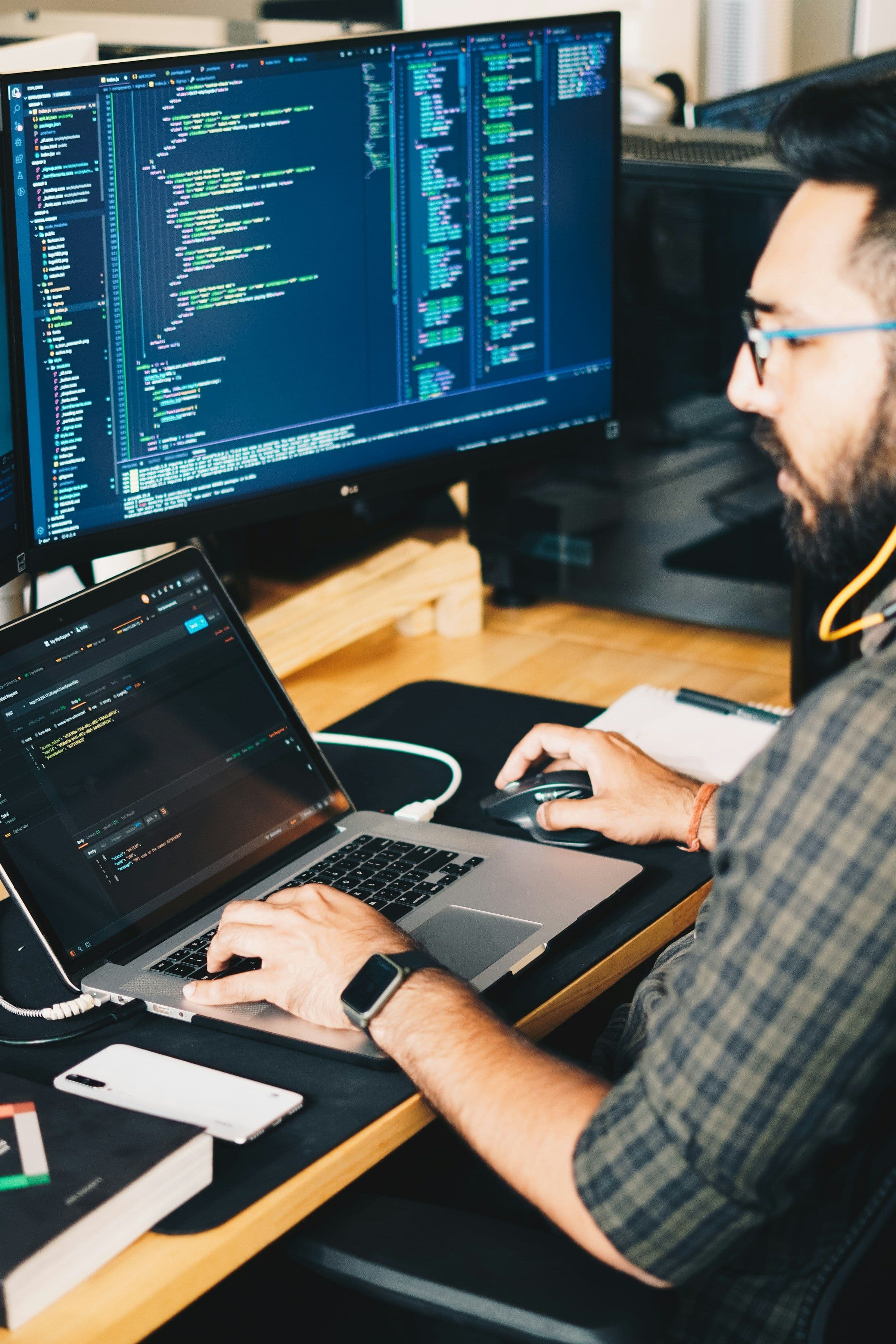 A developer concentrating at a desk